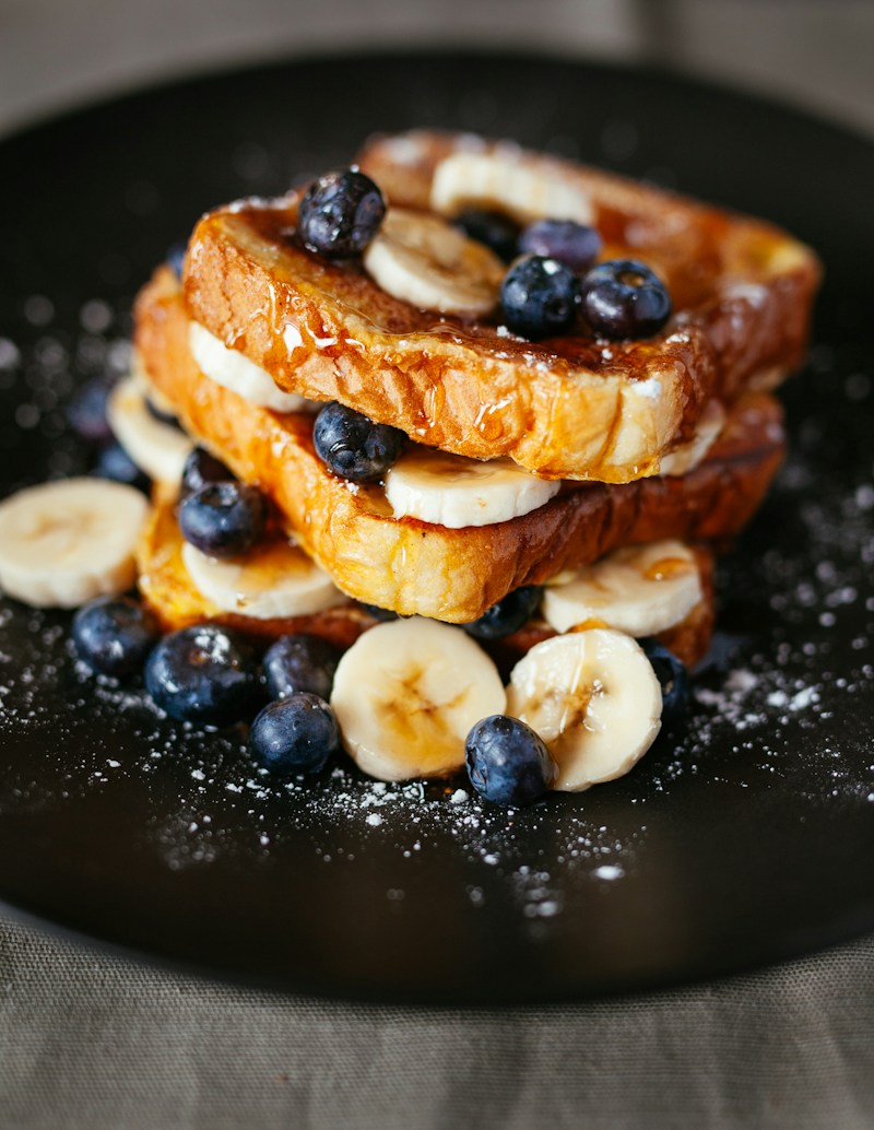 Freshly prepared breakfast with berries and toast